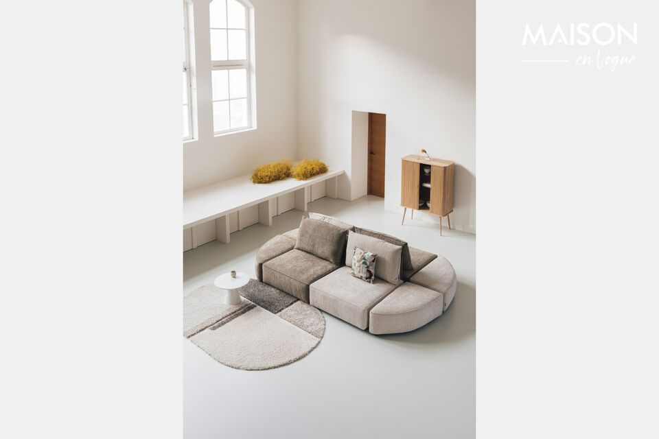 Entdecken Sie Vielseitigkeit und Stil mit unserem modularen Sofa Hunter in grünem Stoff