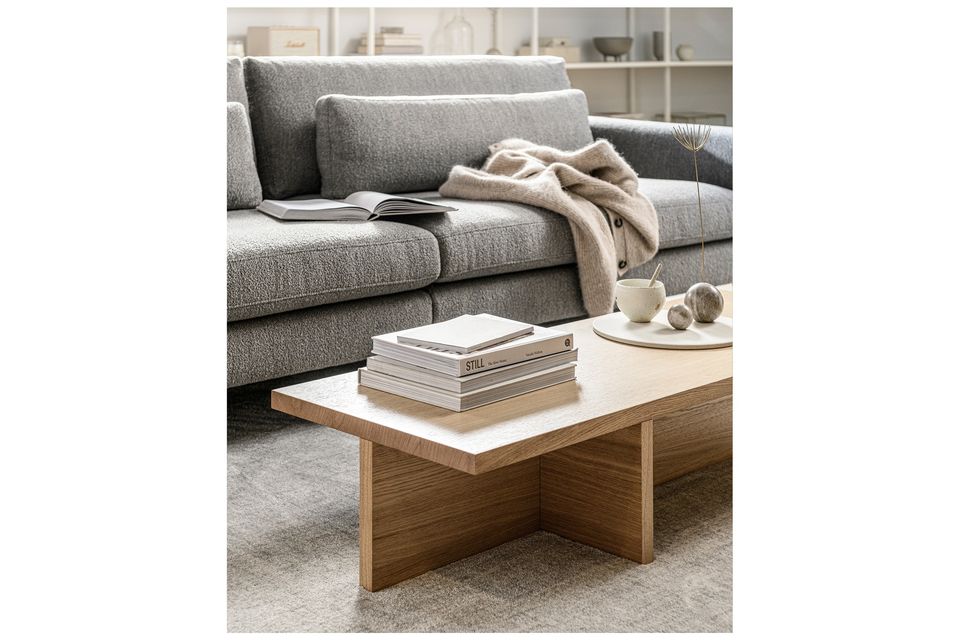 Das bequeme und moderne 4-Sitzer-Sofa in hellgrauem Bouclé-Stoff von VTwonen hat schwarze