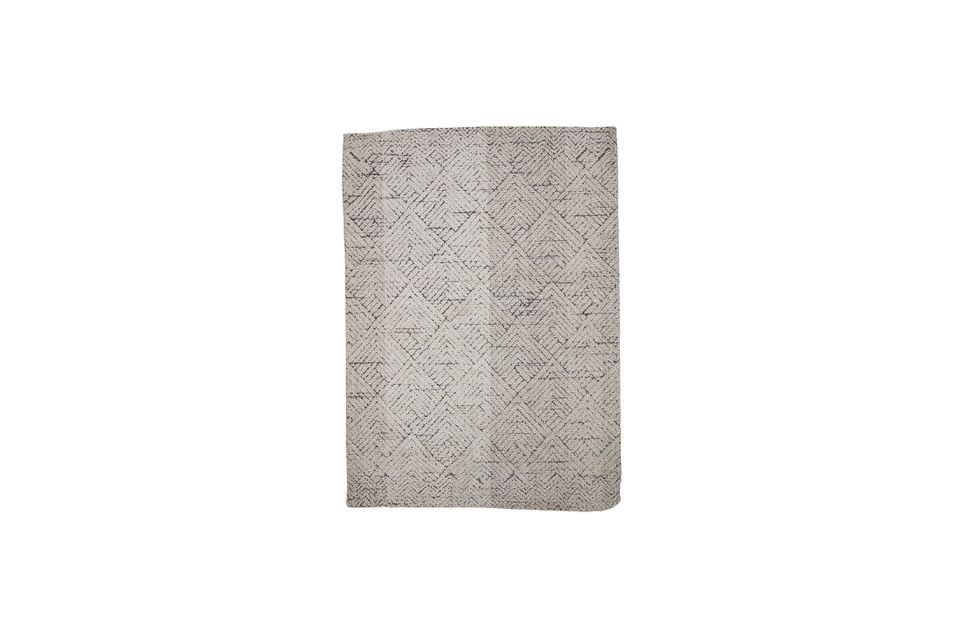 Dieser Teppich würde sich perfekt vor einem Bett