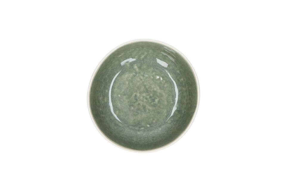 Mit ihrer beruhigenden Farbe Seladongrün und ihrer perfekt symmetrischen Form ist diese Schale